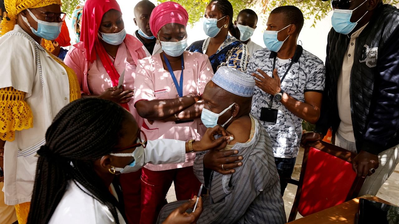 A health worker receives a dose of coronavirus vaccine in Dakar. Credit: Reuters Photo
