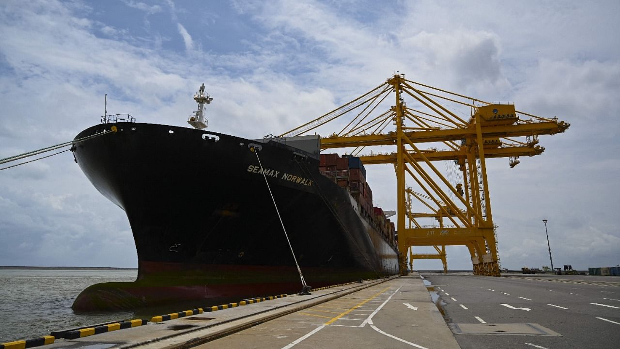 A container vessel is being offloaded at the East Terminal of the Colombo harbour. Credit: AFP Photo