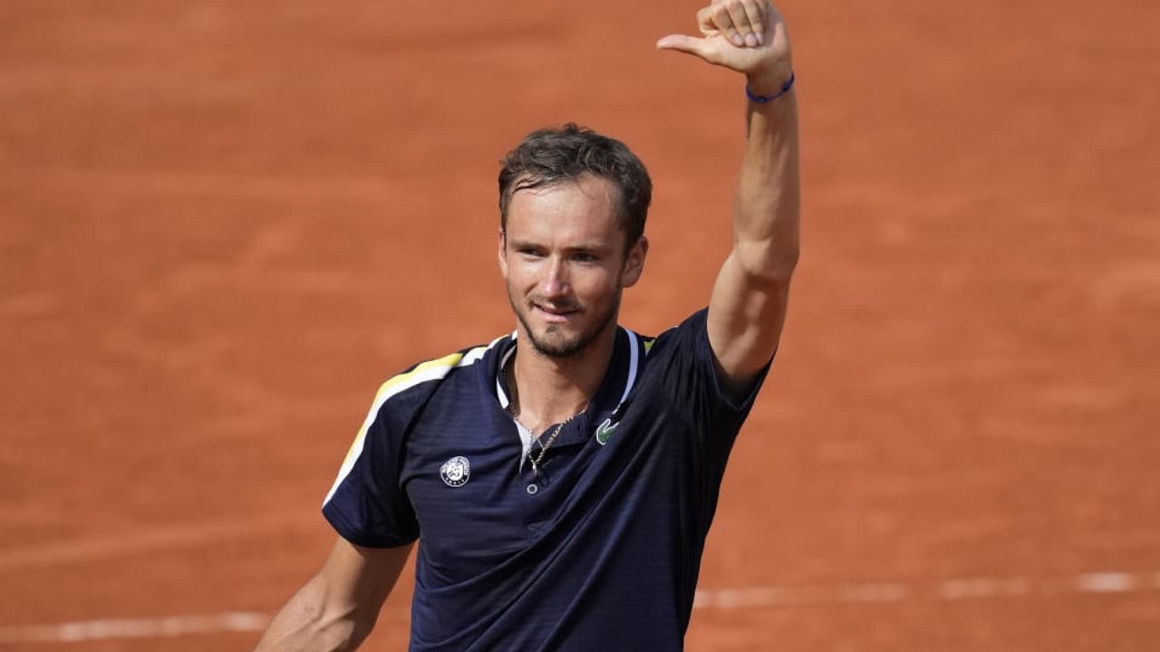 Russia's Daniil Medvedev celebrates after defeating Chile's Cristian Garin during their fourth round match on day 8, of the French Open tennis tournament at Roland Garros in Paris, France, Sunday, June 6, 2021. Credit: AP Photo