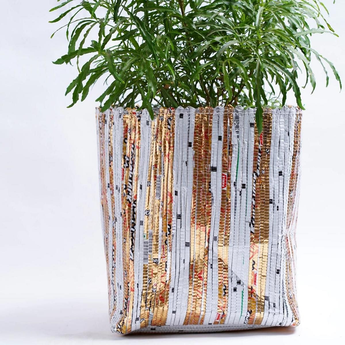 An upcycled handwoven planter by EcoKaari