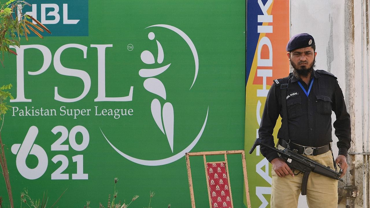 In this file photo taken on February 18, 2021, a policeman stands guard outside the National Cricket Stadium in Karachi ahead of the first T20 cricket match of the Pakistan Super League (PSL) on February 20 between the Karachi Kings and Quetta Gladiators. Credit: AFP Photo