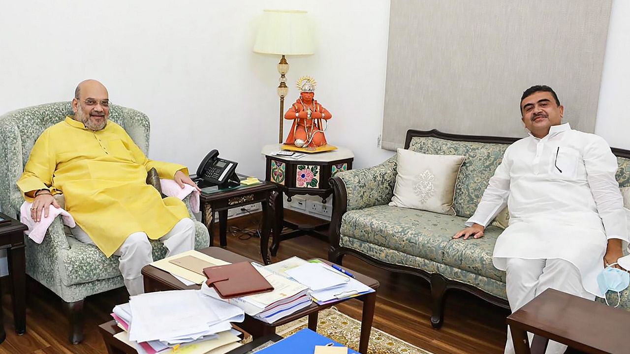 Leader of Opposition of the West Bengal Legislative Assembly and BJP MLA Suvendu Adhikari called on Home Minister Amit Shah. Credit: PTI Photo