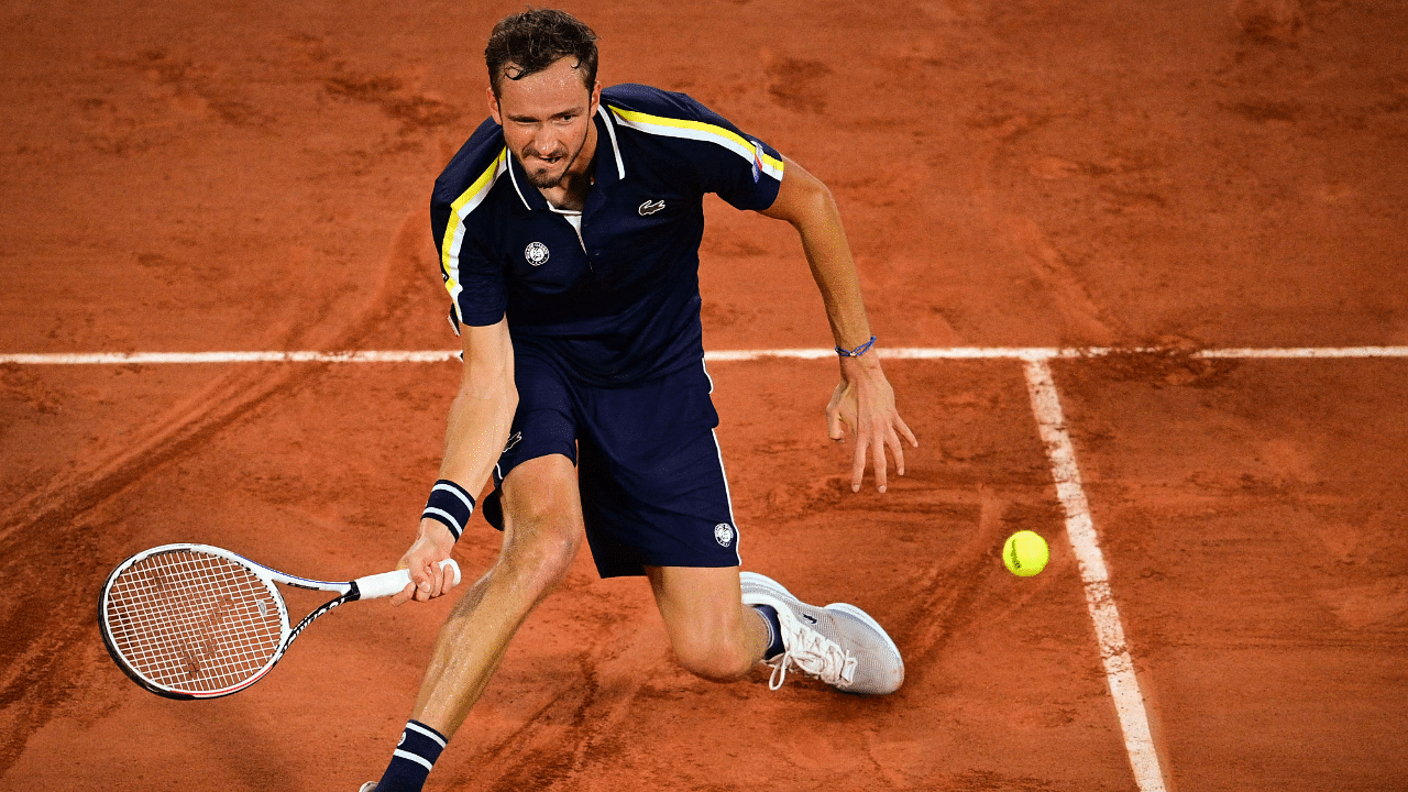 Russia's Daniil Medvedev returns the ball to Greece's Stefanos Tsitsipas. Credit: AFP Photo