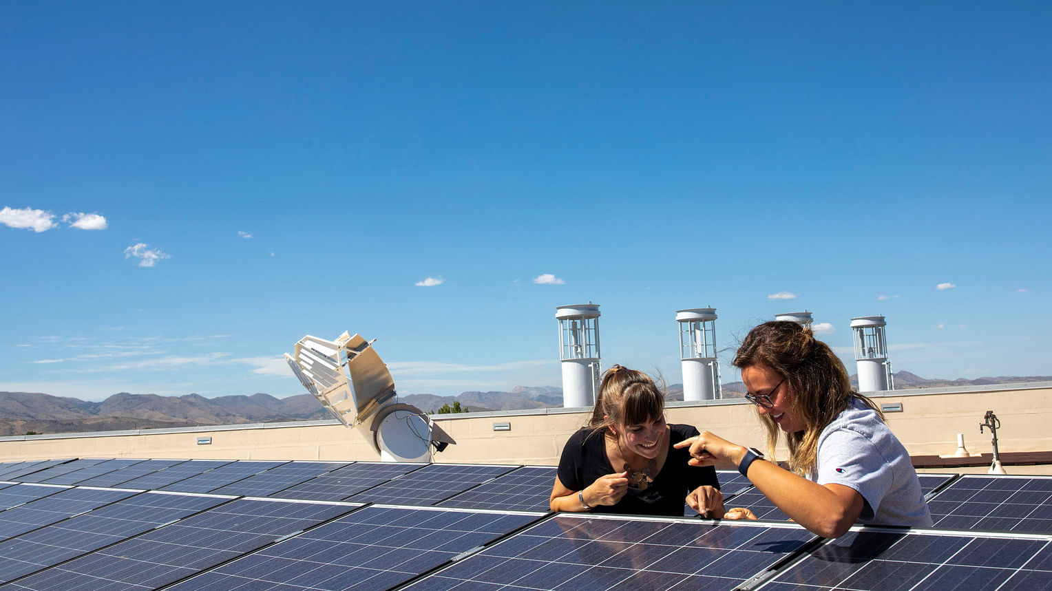 Students at the University of Colorado inspect a solar panel. Scientists say that we will need to find alternate material to construct panels in the future, and that we must also introduce a robust recycling method to salvage valuable materials from panels which reach the end of their life. Courtesy: US State Department