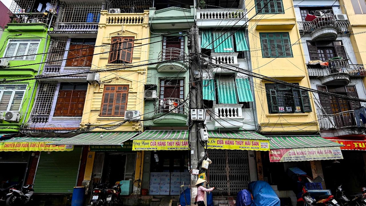 The first tube houses, known as 'nha ong' in Vietnamese, are thought to have appeared in the capital at the end of the 19th century. Credit: AFP Photo