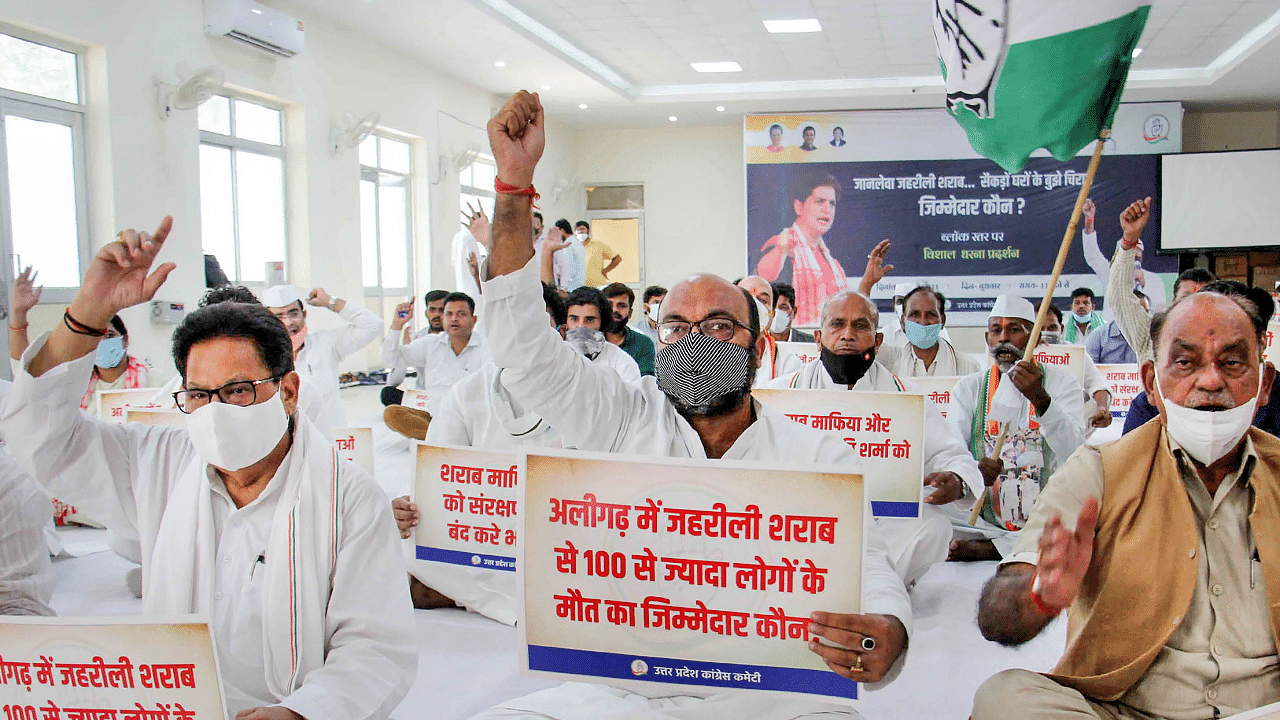 UP Congress President Ajay Kumar Lallu leads a dharna over Aligarh hooch tragedy, at the party office in Lucknow. Credit: PTI Photo