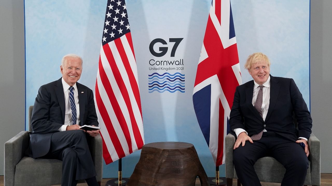 Britain's Prime Minister Boris Johnson and US President Joe Biden look on during their meeting, ahead of the G7 summit. Credit: Reuters Photo