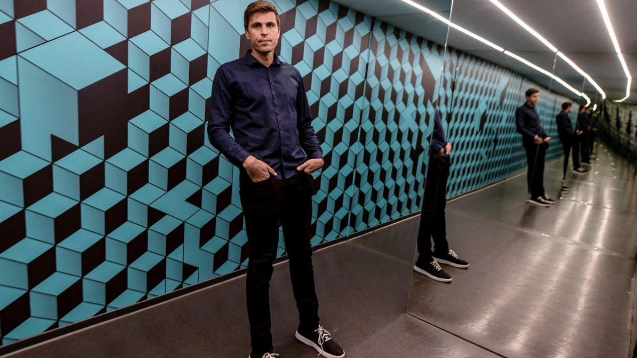 Museum creator Roko Zivkovic poses in the anti-gravity room of Zagreb's Museum of Illusions. Credit: AFP Photo