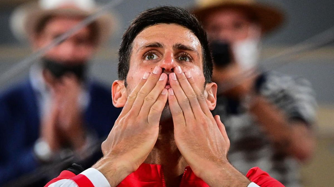 Serbia's Novak Djokovic celebrates after winning against Spain's Rafael Nadal. Credit: AFP Photo