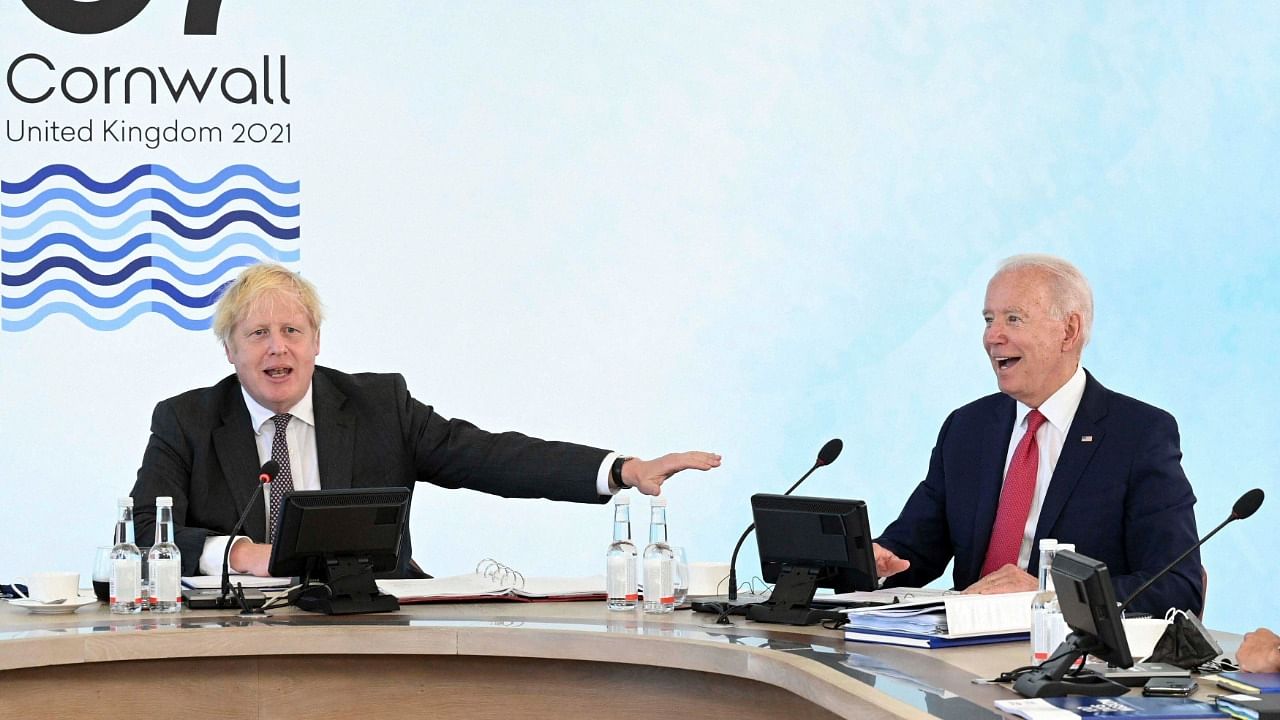 Britain's Prime Minister Boris Johnson, left, and US President Joe Biden during the G7 summit in Cornwall, England, Saturday June 12, 2021. Credit: AP/PTI Photo