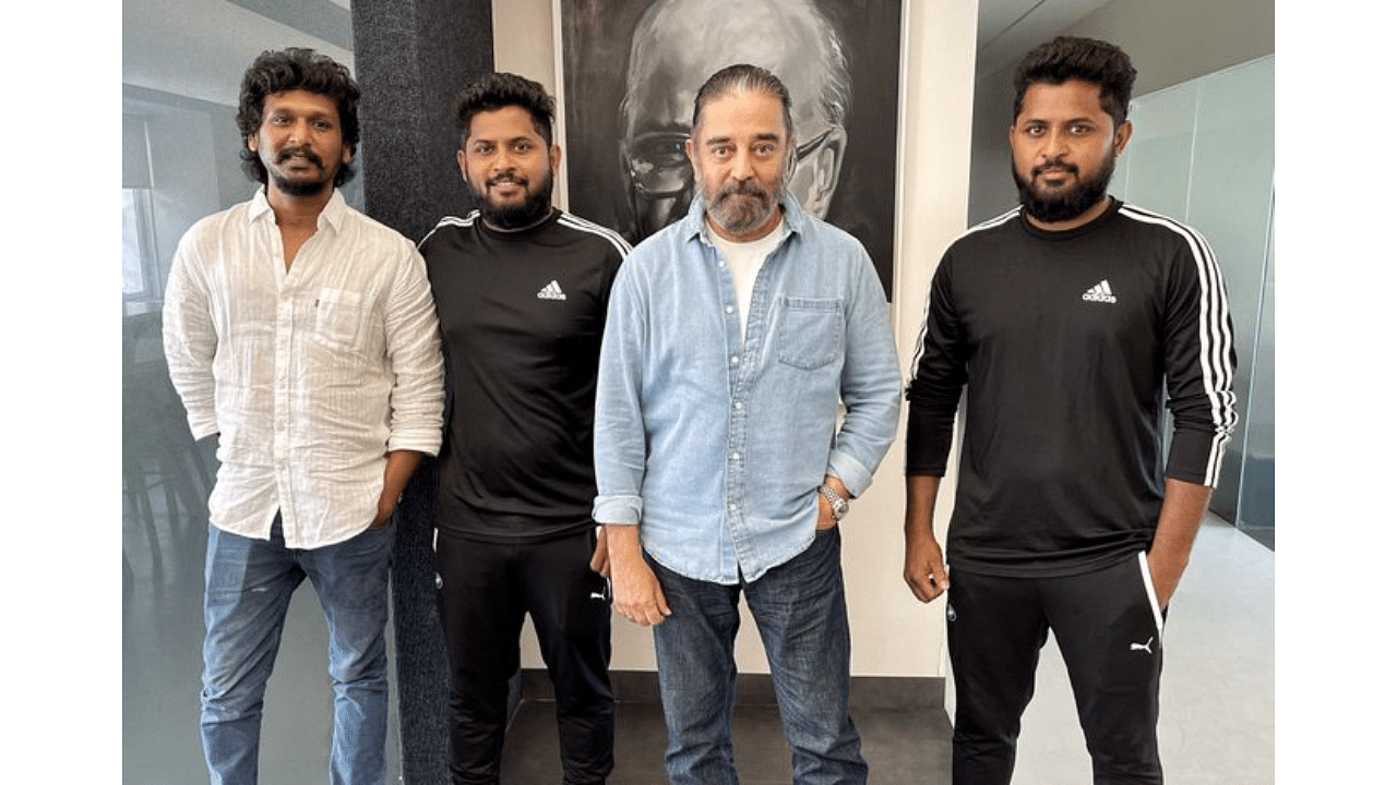 Kamal Haasan with the 'Vikram' team. Credit: Twitter/@Dir_Lokesh