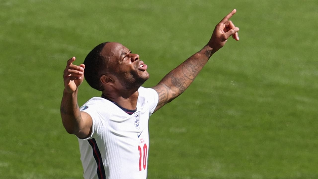 England's forward Raheem Sterling celebrates scoring his team's first and only goal in their Euro 2020 match against Croatia. Credit: AFP Photo