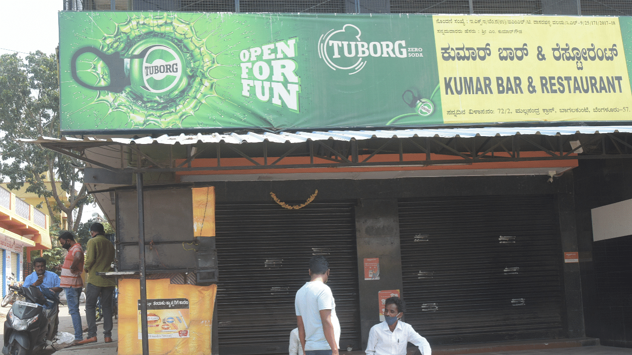 TASMAC, one of the major revenue-generating sources for the state government, sells liquor for about Rs 30,000 crore a year. Credit: DH Photo/Representative Image