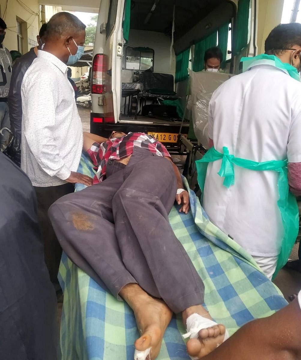Agriculturist Girish being shifted to the hospital.