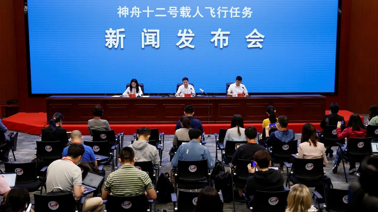 Conference before the Shenzhou-12 mission to build China's space station. Credit: Reuters Photo