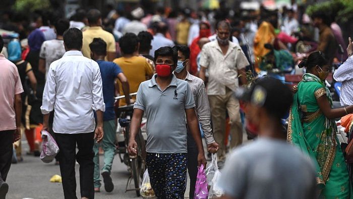 Bengaluru Urban district tops the list of positive cases, with a total of 11,99,143 cases. Credit: AFP Photo