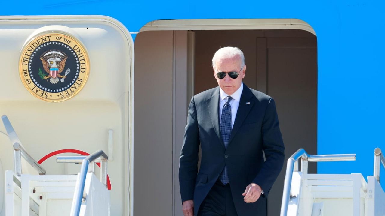 U.S. President Joe Biden steps off Air Force One at Cointrin airport as he arrives ahead of a meeting with Russian counterpart Vladimir Putin in Geneva, Switzerland. Credit: Reuters Photo