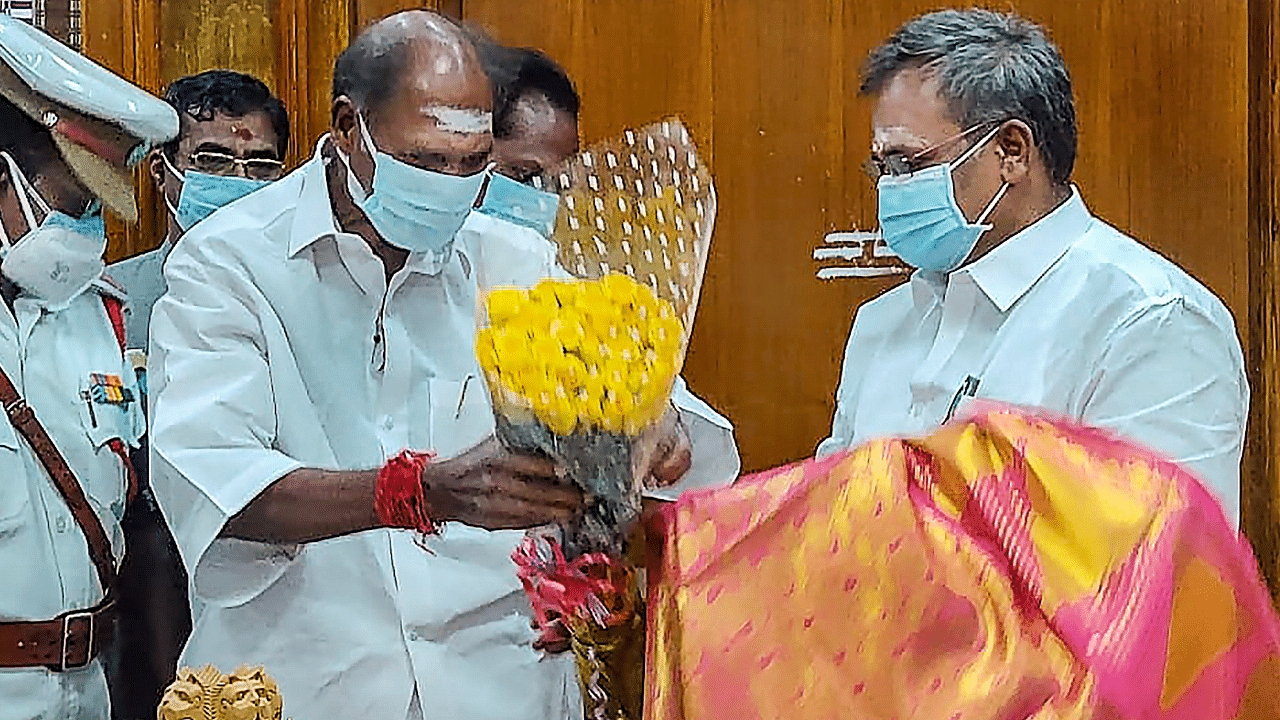 Chief Minister N. Rangasamy felicitates BJP MLA Embalam R Selvam after he was elected as the Speaker of the Legislative Assembly. Credit: PTI Photo