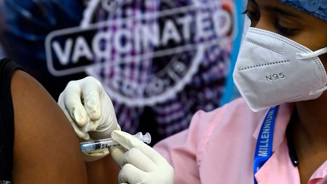 The total number of Covid-19 vaccine doses administered in the country has reached 26,53,17,472. Credit: AFP Photo