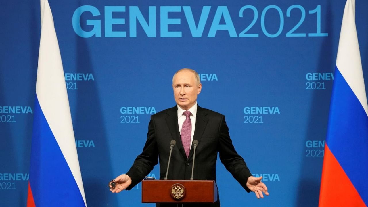 Russian President Vladimir Putin gestures as he speaks during a news conference after his meeting with U.S President Joe Biden at Villa La Grange in Geneva, Switzerland. Credit: Reuters Photo