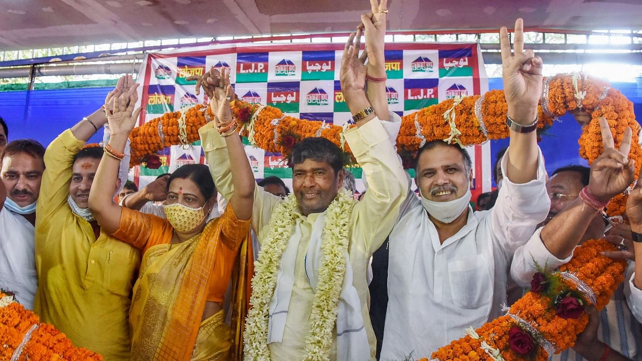 Lok Janshakti Party's Pashupati Kumar Paras being garlanded by supporters after being elected as national president of the party. Credit: PTI Photo