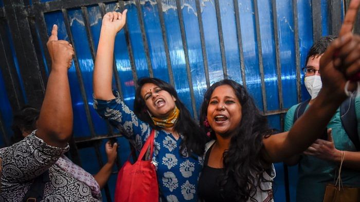 Student activists Natasha Narwal, and Devangana Kalita outside Tihar prison, after a court ordered their immediate release. Credit: PTI Photo