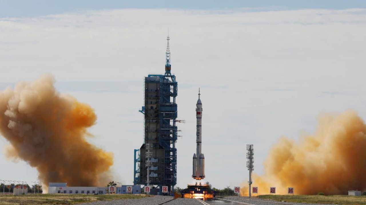 The Long March-2F Y12 rocket, carrying the Shenzhou-12 spacecraft and three astronauts, takes off from Jiuquan Satellite Launch Center for China's first manned mission to build its space station, near Jiuquan, Gansu province, China June 17, 2021. Credit: Reuters Photo
