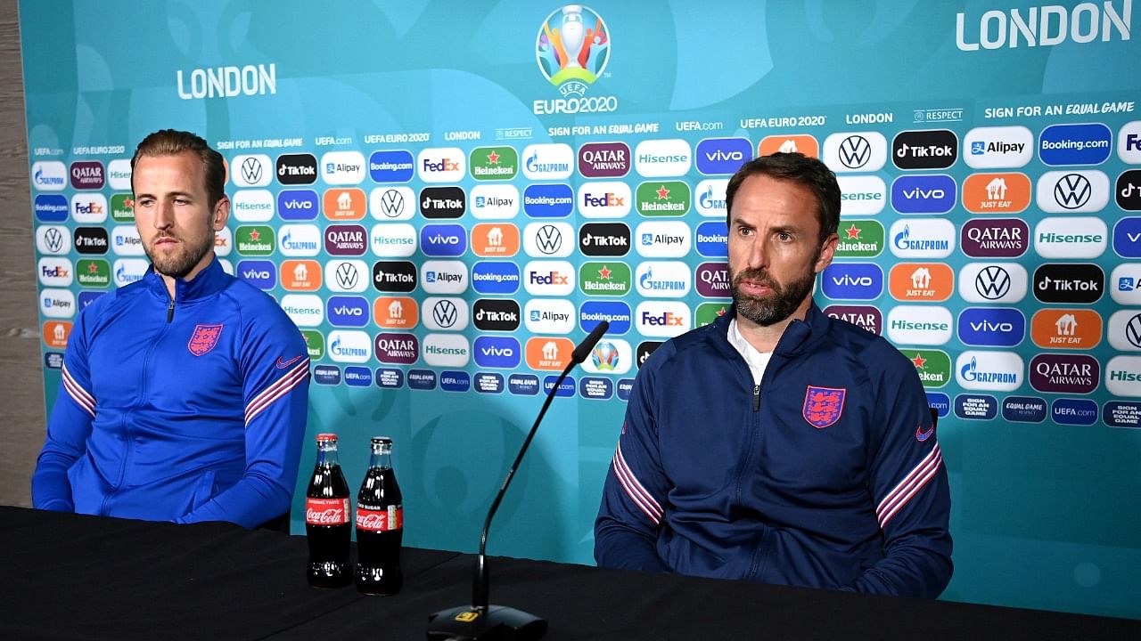 Gareth Southgate (R) and Harry Kane during a press conference. Credit: Reuters Photo