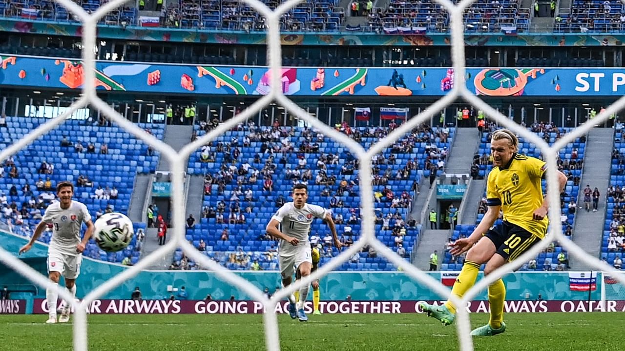 Sweden's midfielder Emil Forsberg scores a penalty during the Euro 2020 match between Sweden and Slovakia. Credit: AFP Photo