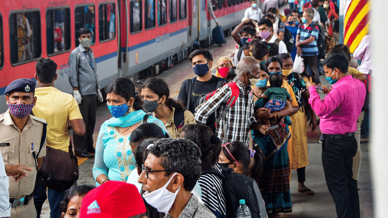 Passengers arriving from Gujarat, wait in a queue for Rapid Antigen Covid-19 test, at Dadar Station in Mumbai. Credit: PTI Photo