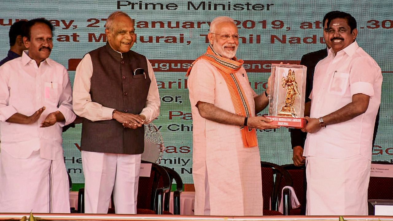 Prime Minister Narendra Modi being felicitated by Tamil Nadu Chief Minister K Palaniswami at the foundation stone laying ceremony of All India Institute of Medical Sciences (AIIMS) in Madurai, Sunday, Jan. 27, 2019. Credit: PTI File Photo