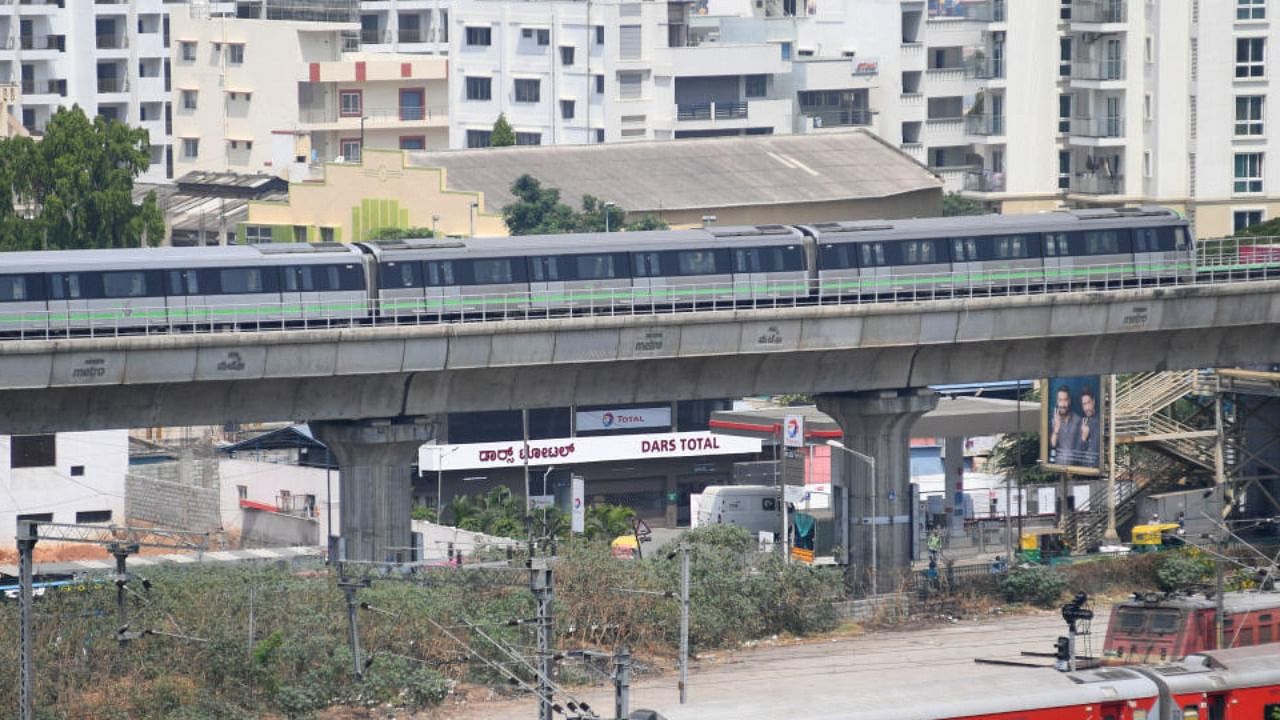 A view Namma metro passing through the city. Credit: DH Photo