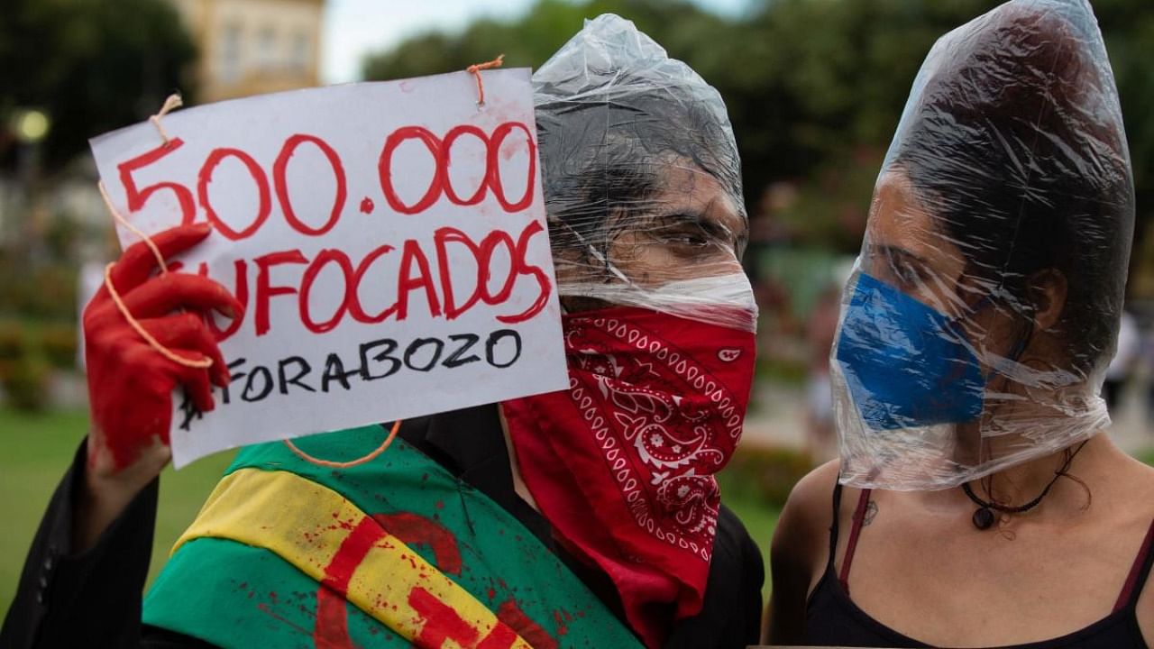 Demonstrators protest against Brazilian President Jair Bolsonaro's handling of the COVID-19 pandemic in Manaus, Brazil. Credit: AFP Photo