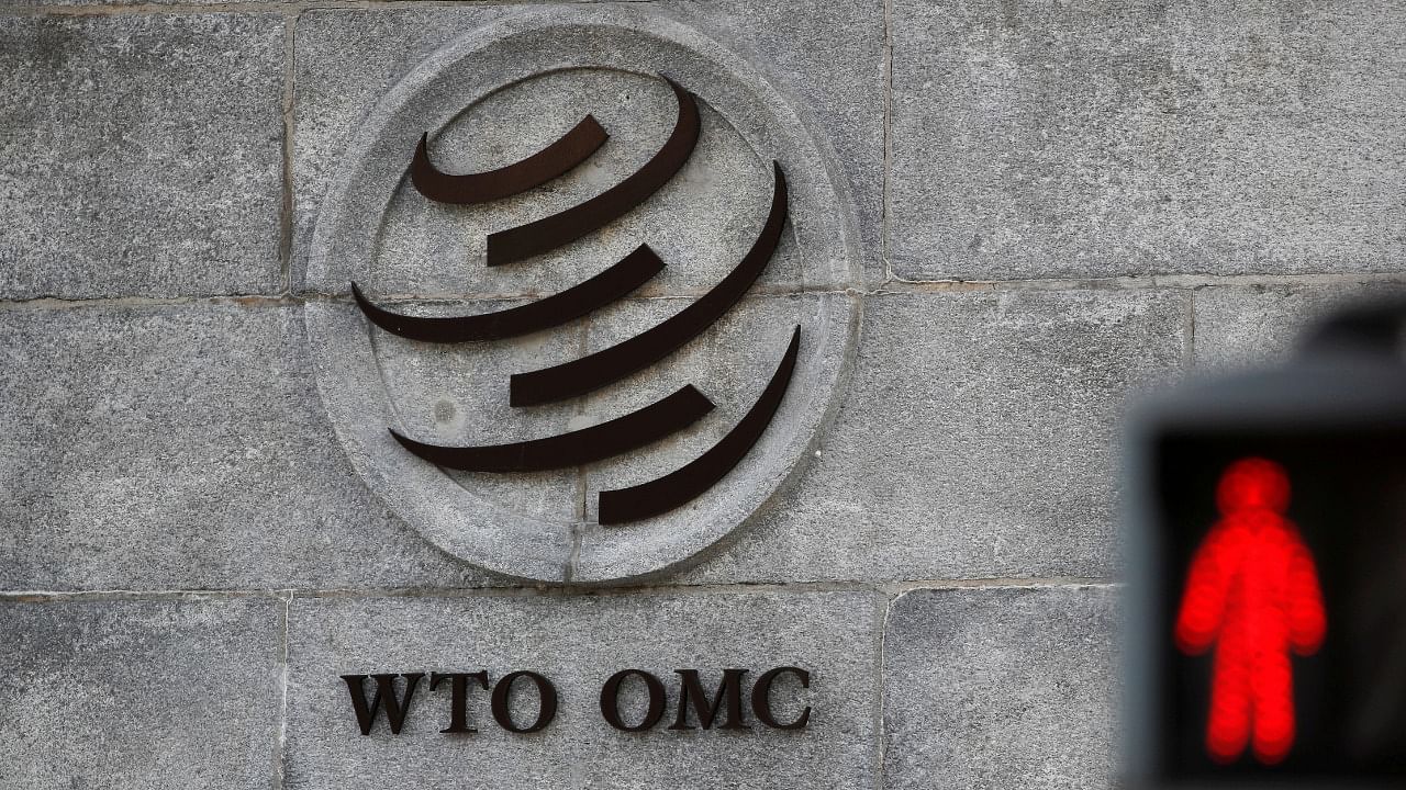  A logo is pictured outside the World Trade Organization (WTO) headquarters next to a red traffic light in Geneva, Switzerland. Credit: Reuters Photo