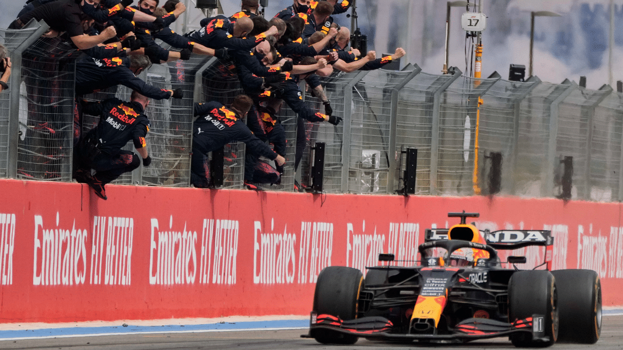 Red Bull personnel cheer as Max Verstappen wins the French Grand Prix on Sunday. Credit: AP/ PTI Photo