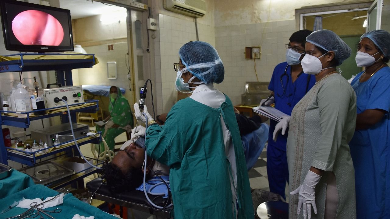 Doctors performe Diagnostic Nasal Endoscopy on a patient to detect Black fungus, at ENT Hospital, in Hyderabad. Credit: PTI Photo