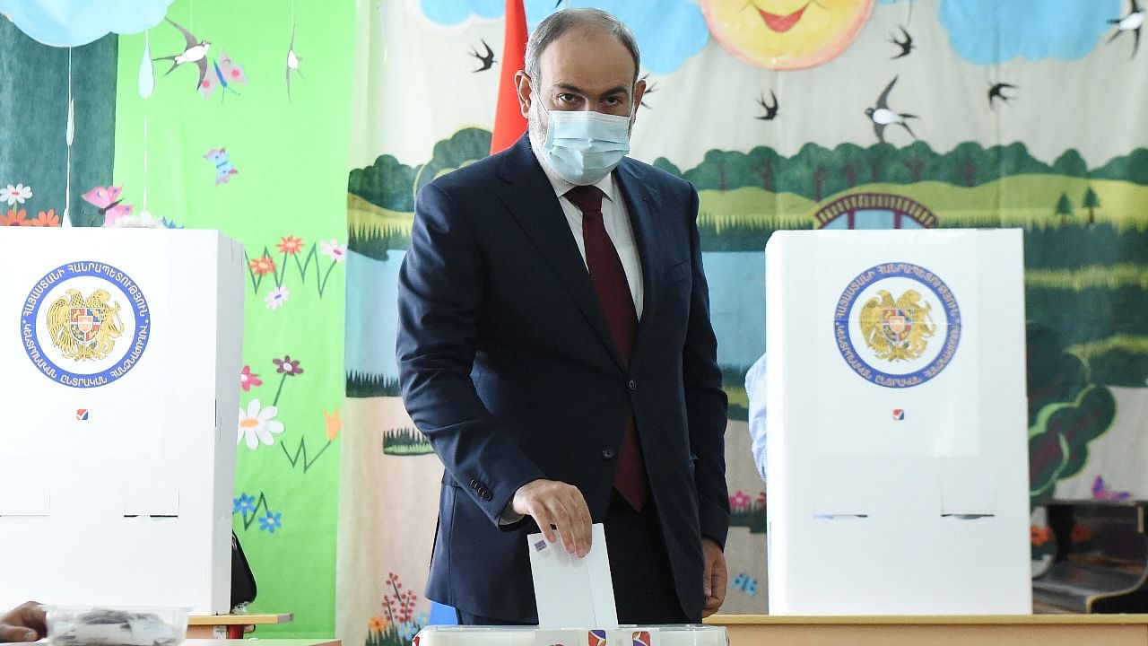 Armenia's acting Prime Minister and leader of Civil Contract party Nikol Pashinyan casts his vote at a polling station during the snap parliamentary election in Yerevan. Credit: Reuters Photo