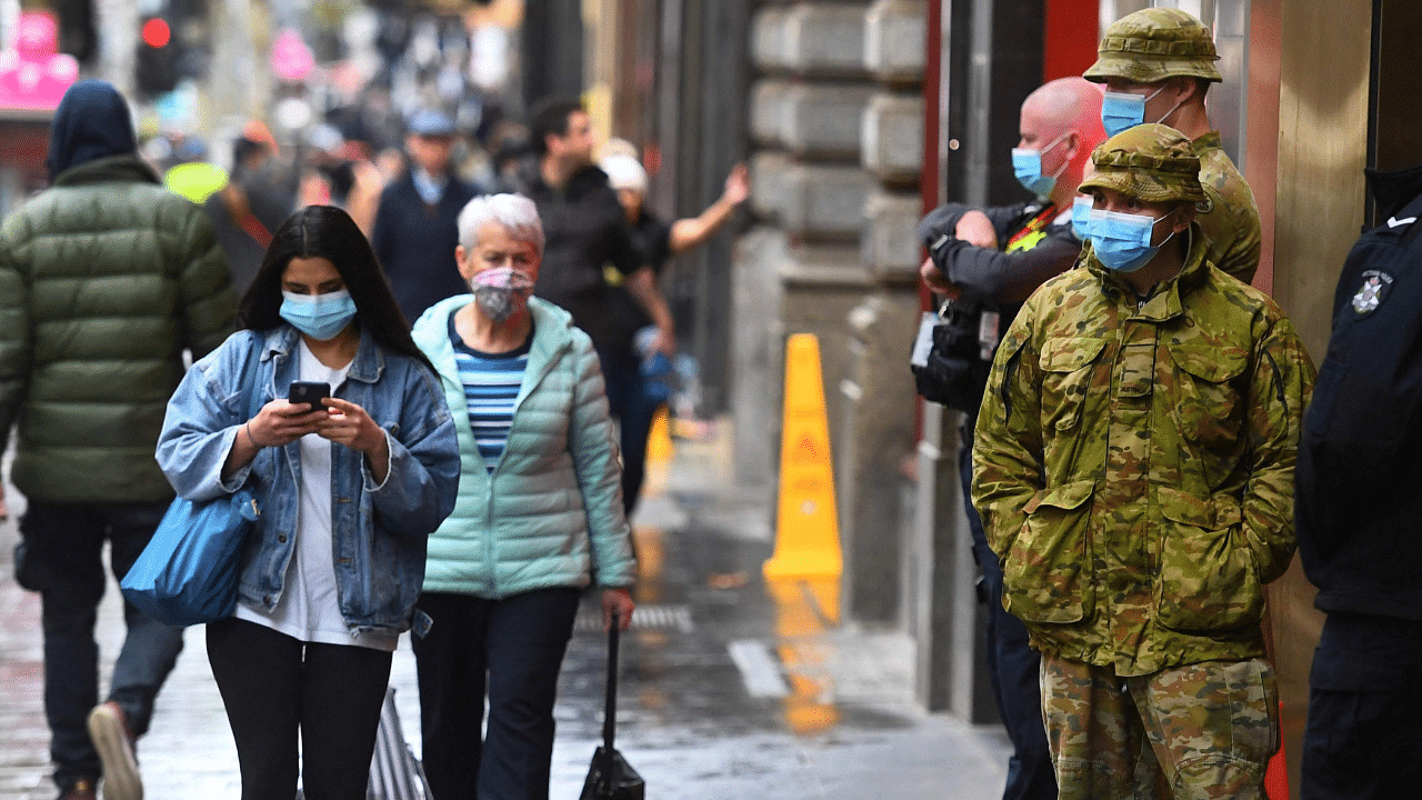 In its efforts to quash the outbreak, the NSW government made masks mandatory in Sydney's buses, trains and ferries for five days. Credit: AFP Photo