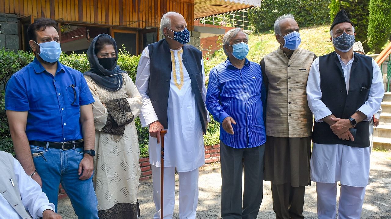 National Conference (NC) President Farooq Abdullah and PDP Chief Mehbooba Mufti with other members during a media address after a meeting of People's Alliance for Gupkar Declaration (PAGD), in Srinagar. Credit: PTI Photo