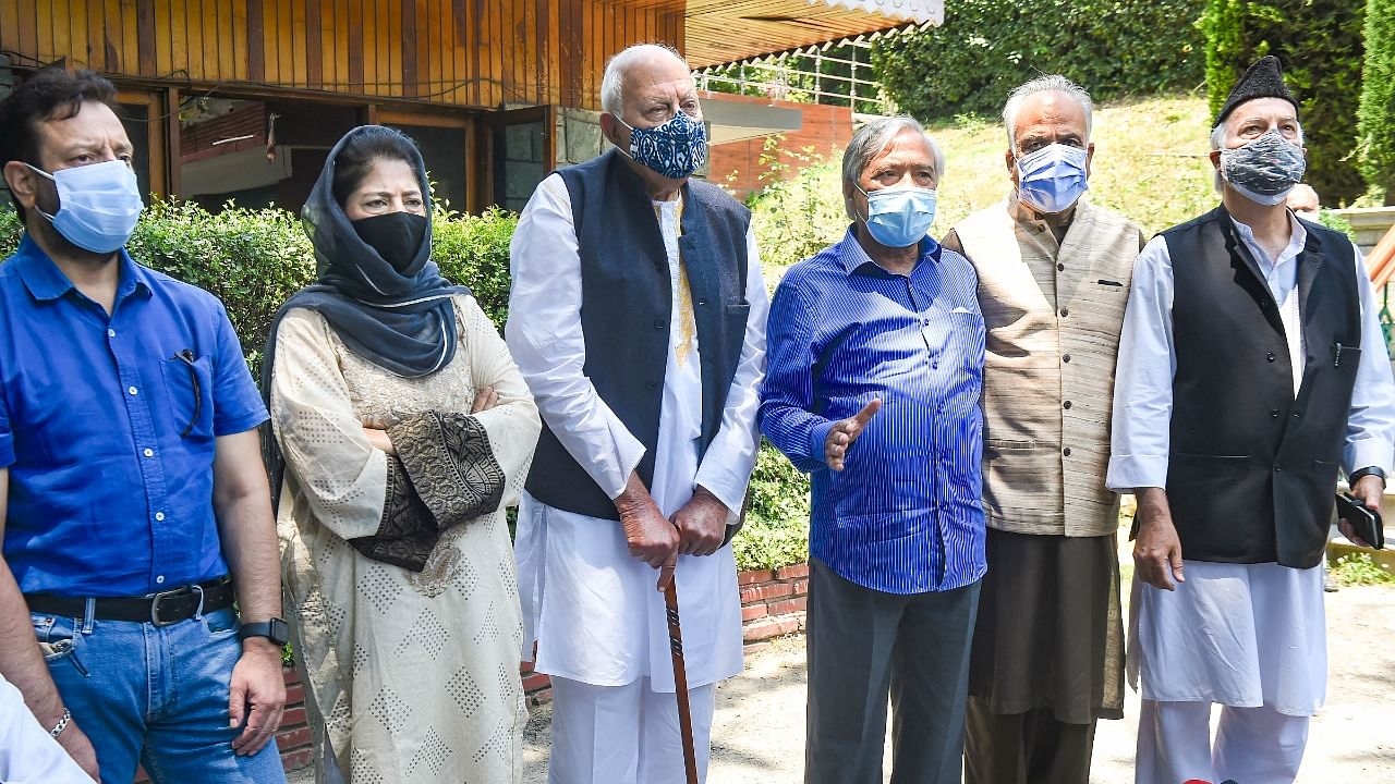 National Conference (NC) President Farooq Abdullah and PDP Chief Mehbooba Mufti with other members after PAGD meeting. Credit: PTI File Photo