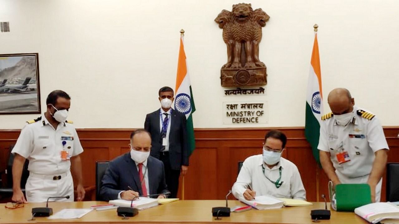 Ministry of Defence officials sign a contract with Goa Shipyard Ltd (GSL) for construction of two Pollution Control Vessels (PCVs) for the Indian Coast Guard. Credit: PTI Photo