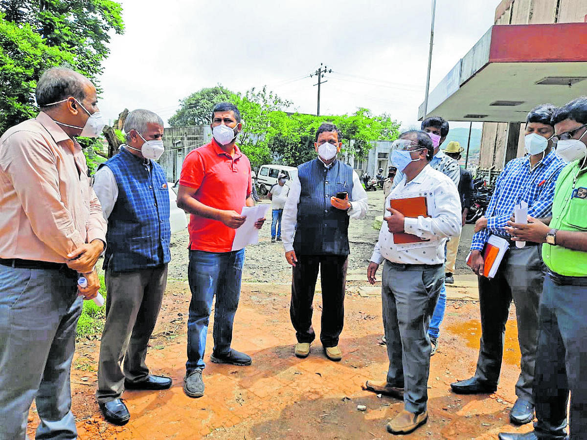 MP Pratap Simha and MLA K G Bopaiah conduct a spot inspection towards the construction of an oxygen plant in Madikeri. Credit: special arrangement