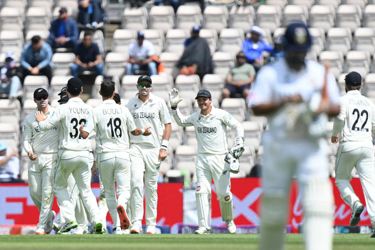 New Zealand players celebrate the dismissal of India's Rishabh Pant on the final day of the ICC World Test Championship Final between New Zealand and India at the Ageas Bowl in Southampton. Credit: AFP Photo