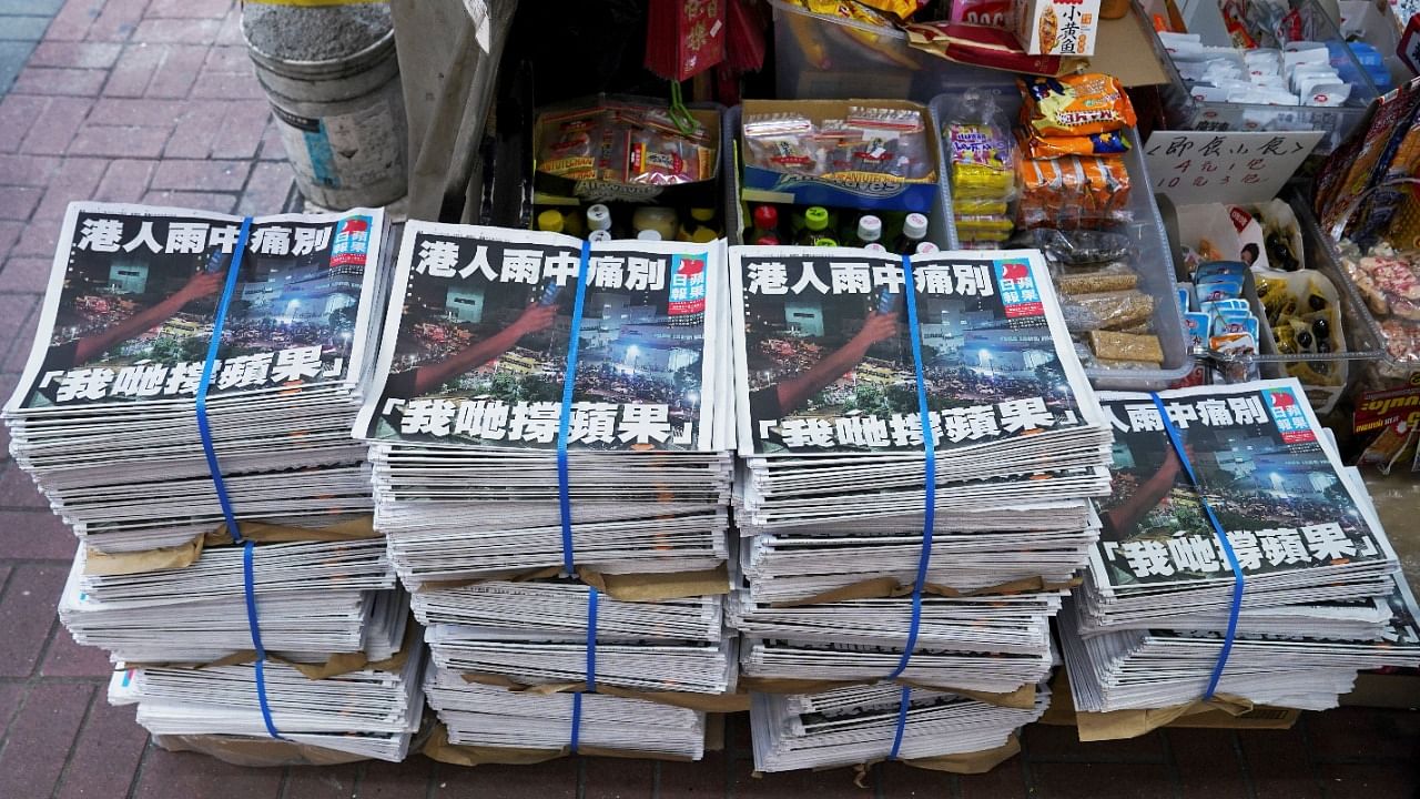 Copies of the final edition of Apple Daily are seen at a newsstand in Hong Kong. Credit: Reuters Photo