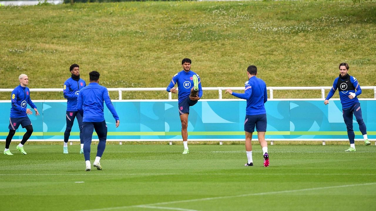 England's defender Tyrone Mings (C) and England's players take part in a training sesssion at St George’s Park in Burton-on-Trent on June 24, 2021 during the UEFA EURO 2020 European Football Championship. Credit: AFP Photo