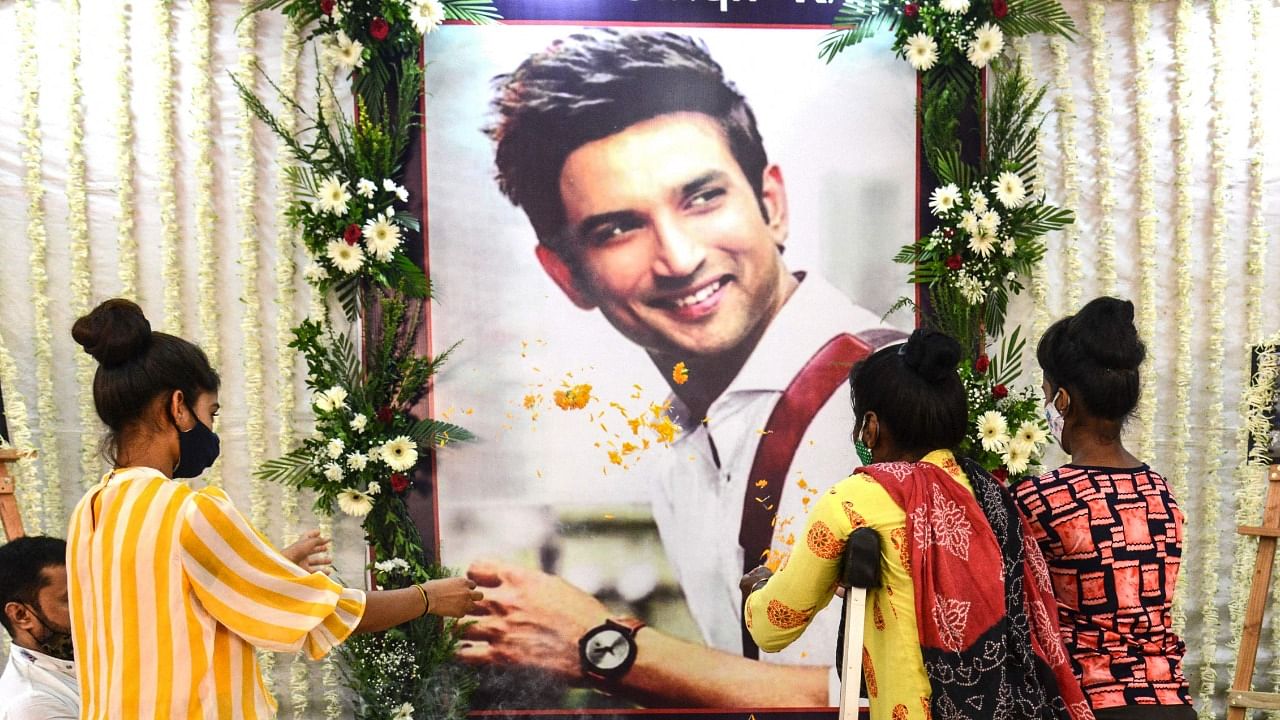 Fans of late Bollywood actor Sushant Singh Rajput commemorate his first death anniversary, in Mumbai on June 14, 2021. Credit: AFP Photo
