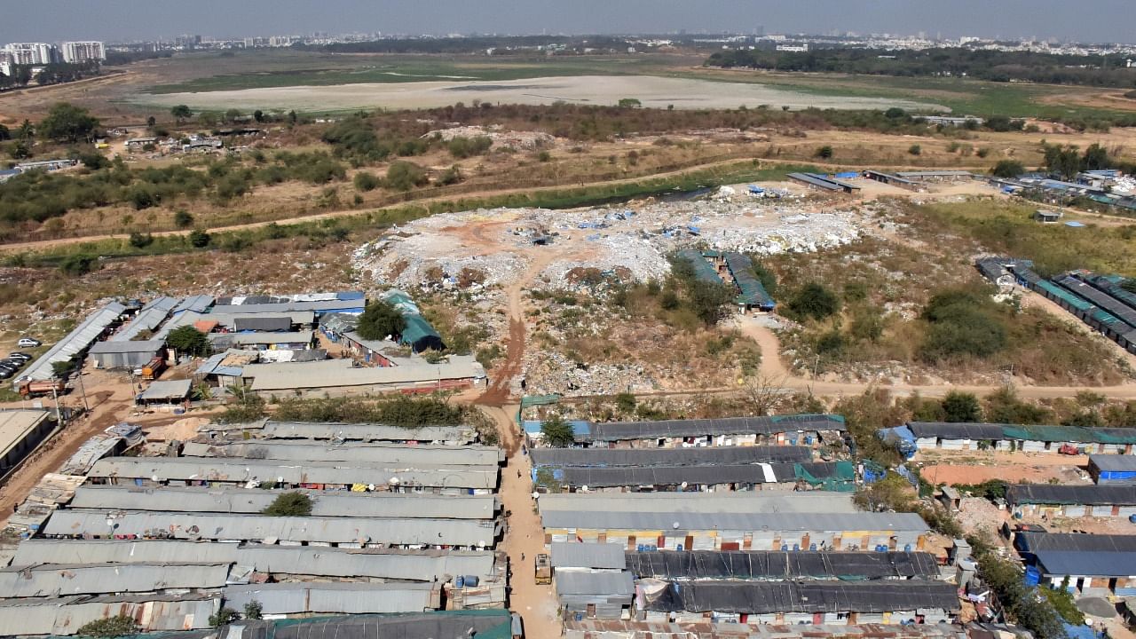 A bird's-eye view of Bellandur Lake, Bengaluru's largest, shows encroachments and dumping of debris. Credit: DH file photo