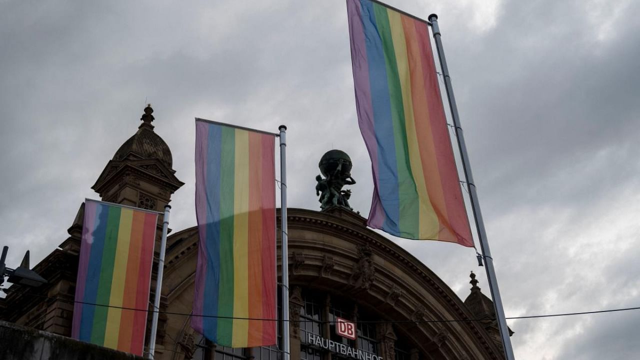 Rainbow flags wave outside the main train station in Frankfurt am Main, western Germany. Credit: AFP Photo