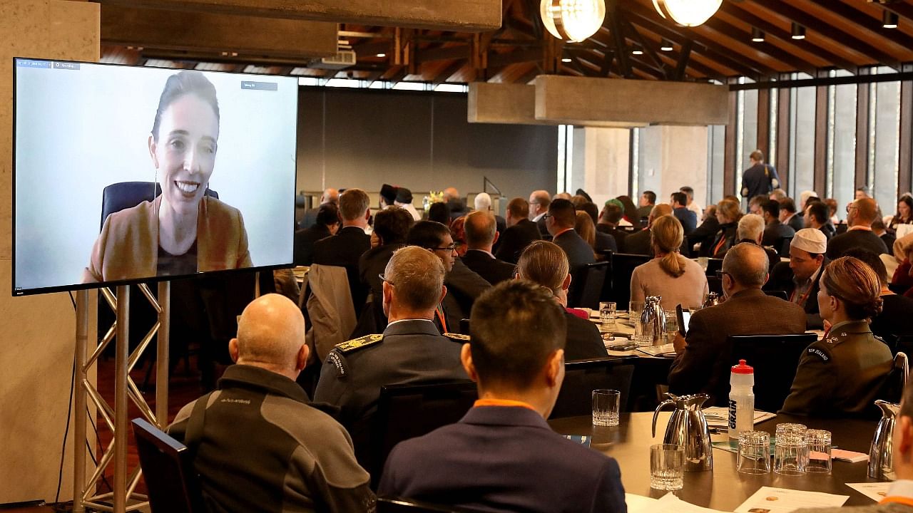 New Zealand's Prime Minister Jacinda Ardern delivers her opening address via Zoom during the first day of the country's first annual hui (gathering) on countering terrorism and violent extremism in Christchurch Town Hall. Credit: AFP Photo