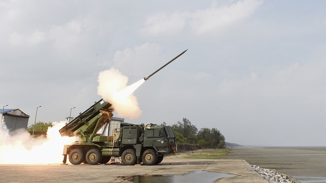 A Multi-Barrel Rocket Launcher (MBRL) of Defence Research and Development Organisation (DRDO, test fires a Pinaka rocket, at Chandipur beach in Balasore district. Credit: PTI Photo